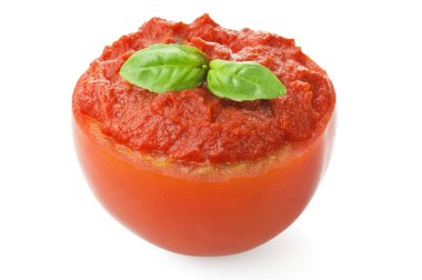 Half Tomato filled with sauce and basil clipart