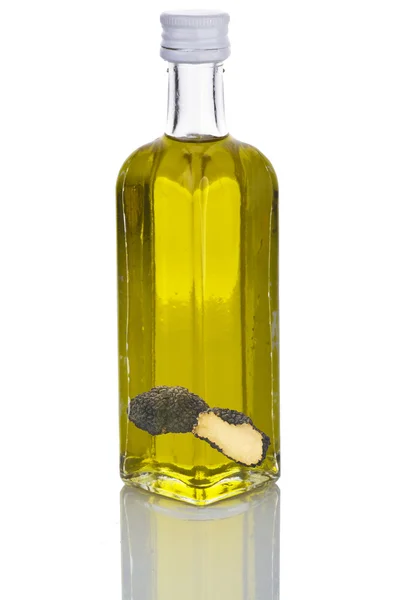 Bottle of truffle oil on white — Stock Photo, Image