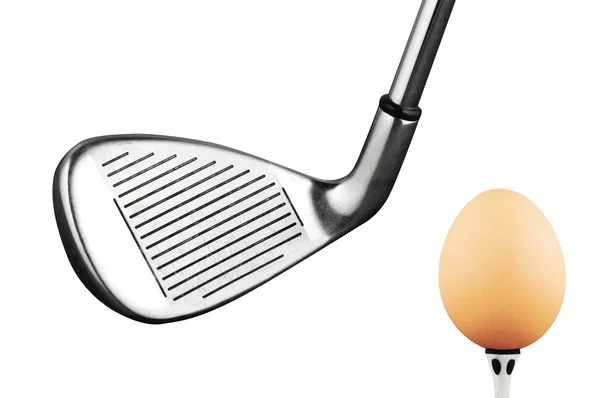 Photo of a golf iron club and egg — Stock Photo, Image