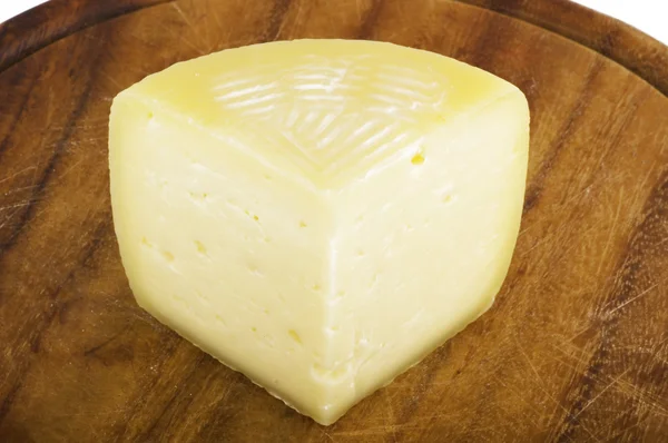 Кусок итальянского сыра — стоковое фото
