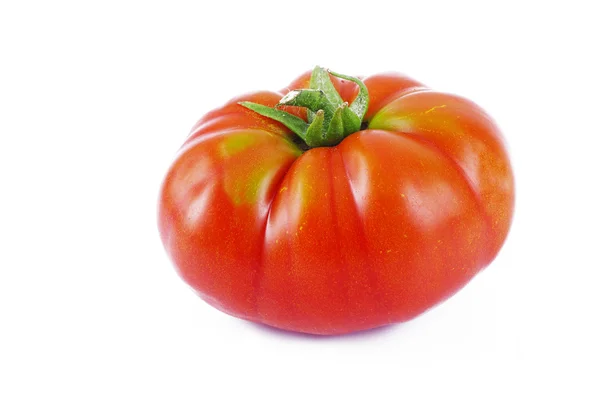 Punainen tomaatti — kuvapankkivalokuva