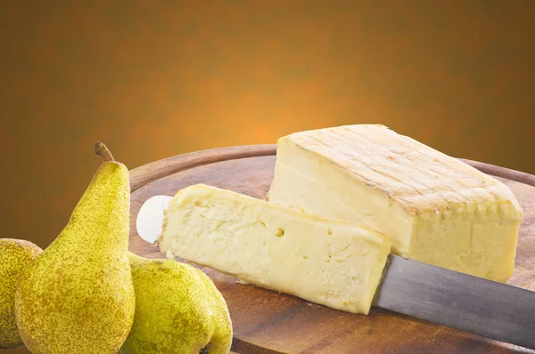 Taleggio cheese sliced — Stock Photo, Image