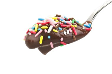 Spoon with pudding and candies clipart