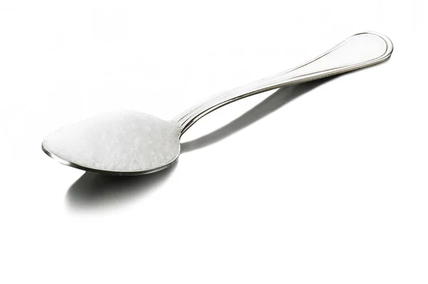 Una cuchara llena de azúcar — Foto de Stock