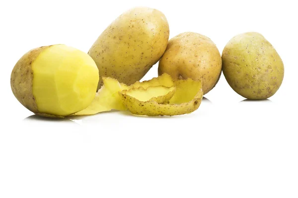 Batatas com batata descascada — Fotografia de Stock