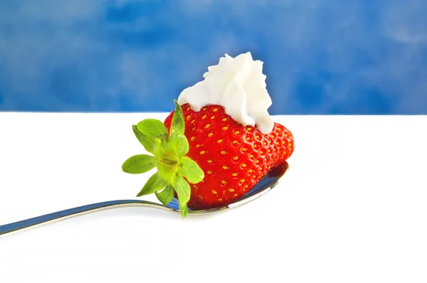Strawberry on the spoon — Stock Photo, Image
