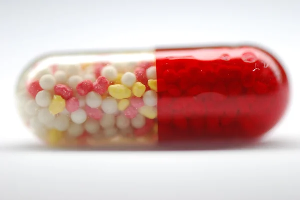 stock image Transparent pill on a white background