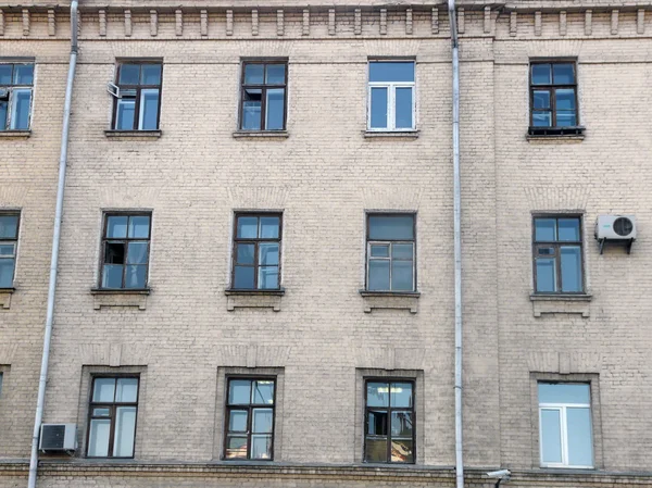 stock image Facade of building in the evening with windows