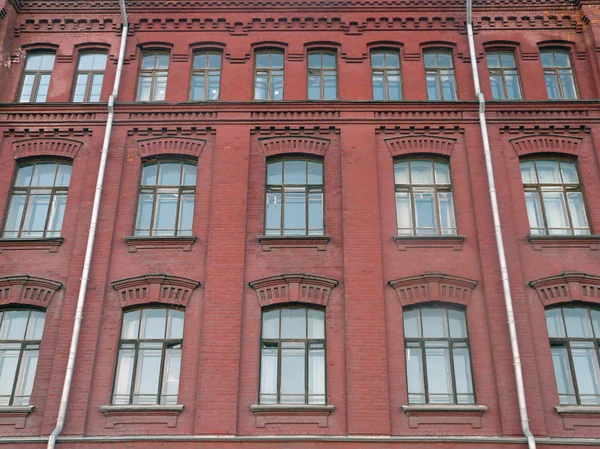 stock image Facade of building in the evening with windows