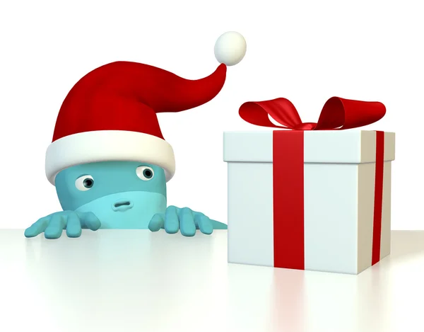 Arnold con sombrero de Santa mirando un regalo — Foto de Stock