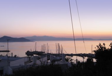 Coastal scenery in Greece at evening time clipart