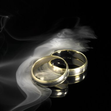 Golden wedding rings and smoke clipart