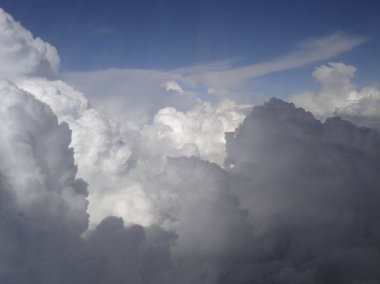 Above dramatic clouds and sky clipart