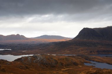 Surreal illuminated landscape near Stac Pollaidh clipart