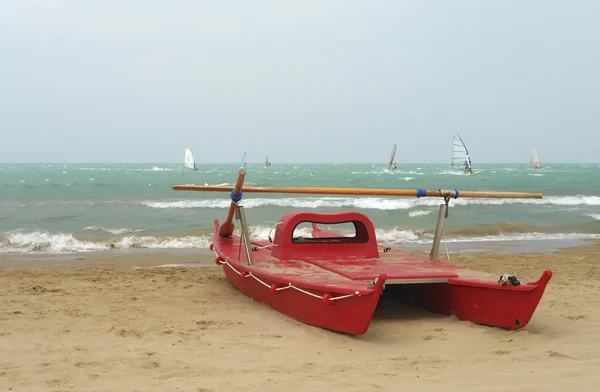 Red catamaran at the beach — Stock Photo, Image