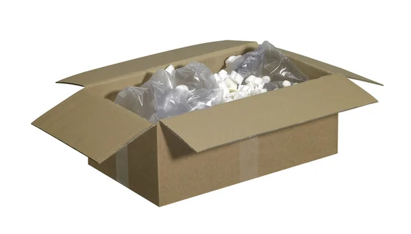 Открытая коробка, включая заполняющий материал — стоковое фото