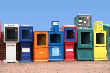 Various news racks in a row clipart