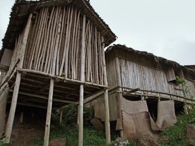 Wooden houses in Africa clipart