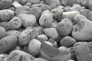 Grey pebbles background clipart