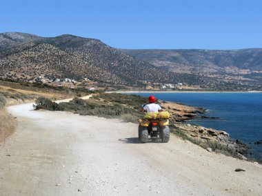 Quad driving at Naxos clipart