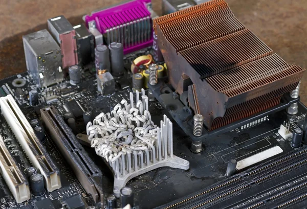 Main board with molten heat sink — Stock Photo, Image