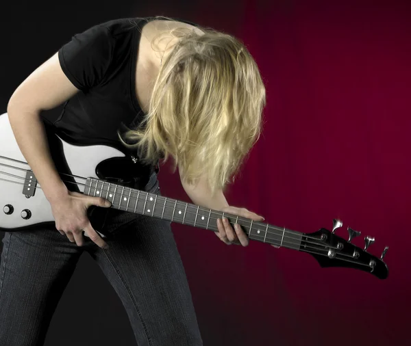 stock image Playing bass guitar