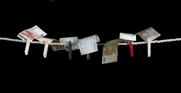 Varal e dinheiro — Fotografia de Stock