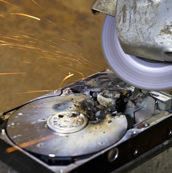 Hard disk driveand angle grinder — Stock Photo, Image