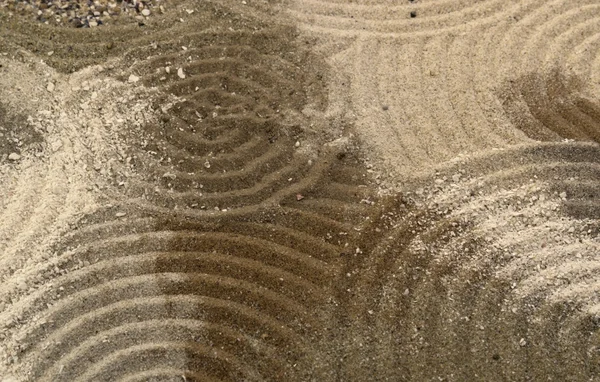 Cirklar på mångfärgade sand yta — Stockfoto