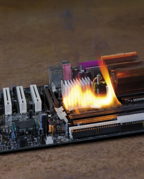 Burning motherboard — Stock Photo, Image