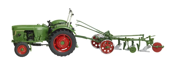 Saban ile nostaljik oyuncak traktör — Stok fotoğraf