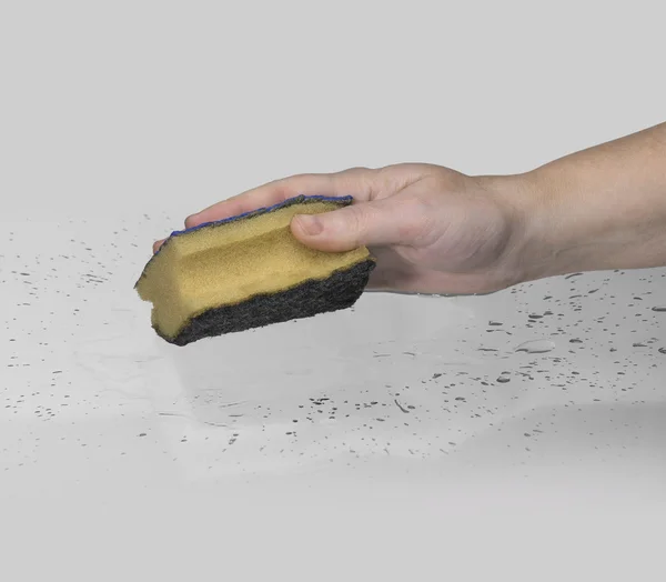 Stock image Hand scrubbing with a sponge