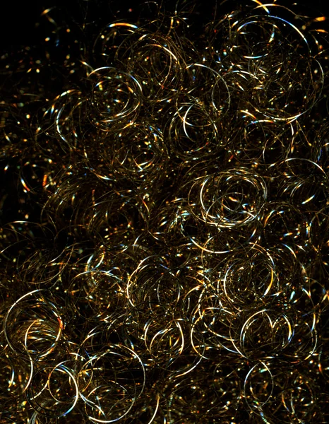 Golden metallic loops — Stock Photo, Image