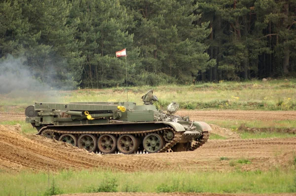 stock image Offroad scenery with driving tank