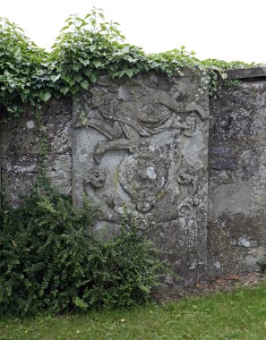 Old stone relief on a wall clipart