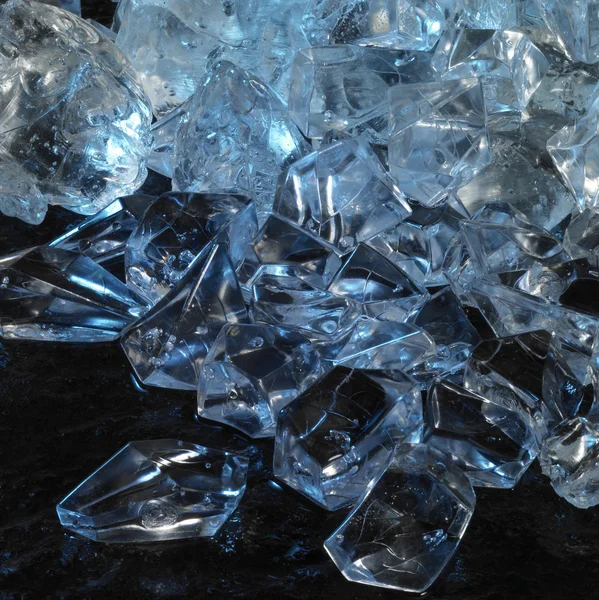 Blue illuminated ice cubes — Stock Photo, Image