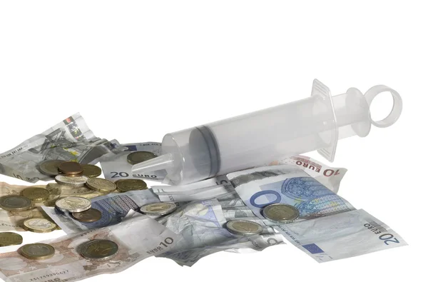 Syringe filled with money — Stock Photo, Image