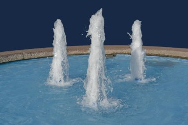 Three fountains in blue back clipart