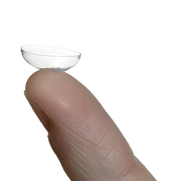 Lente de contato na ponta do dedo — Fotografia de Stock