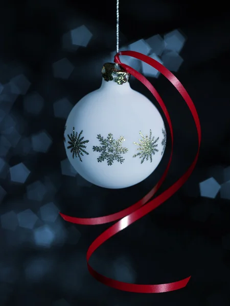 Christmas bauble with red bow — Stock Photo, Image
