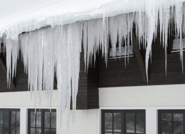 Icicles and house facade clipart