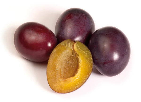 Plums in light back — Stock Photo, Image