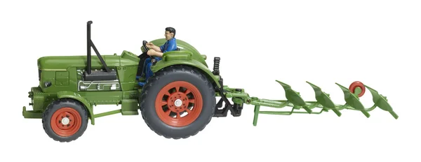 Tracteur jouet nostalgique avec charrue — Photo
