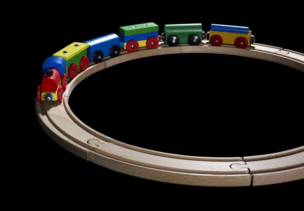 Wooden toy train on tracks — Stock Photo, Image