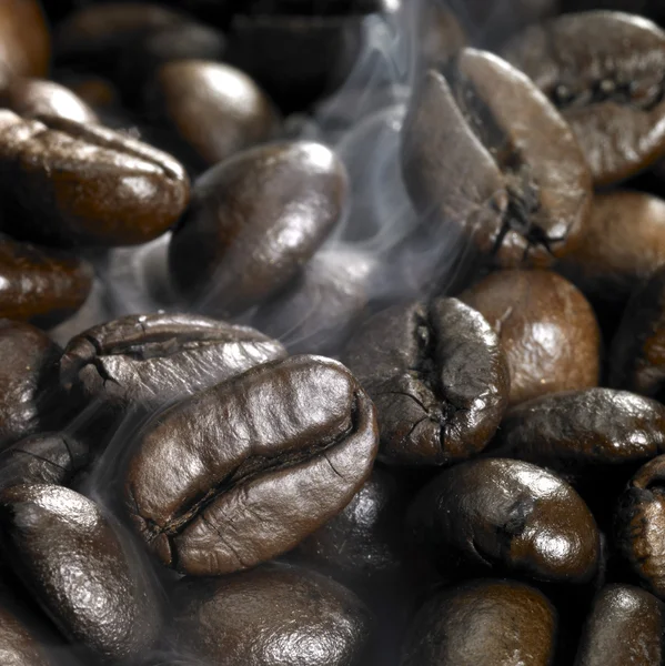 stock image Roasted coffee beans and smoke