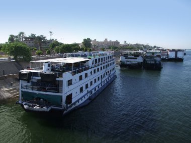 Passenger ships on the Nile near Luxor clipart