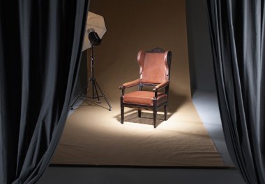 Chair in a photostudio clipart