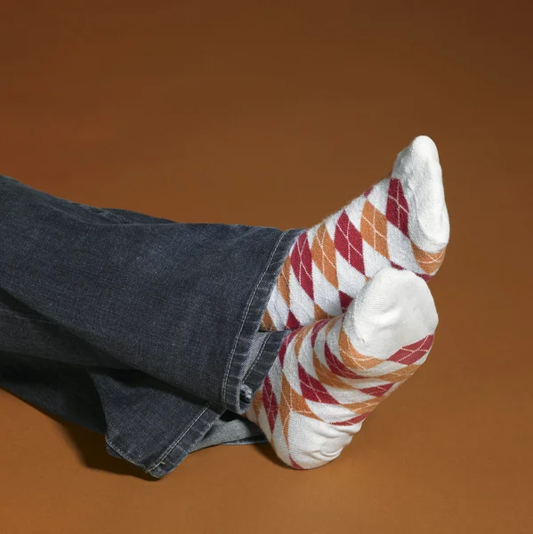 Ruhende Füße in Socken — Stockfoto