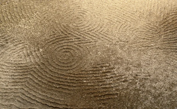 Chouette abstraite dans le sable brun — Photo