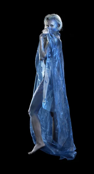 Blue bodypainted woman and fabrics — Stock Photo, Image
